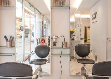 Sleek modern salon chairs and equipment at Vida hair & beauty The Brewery, Romford, England, GB.