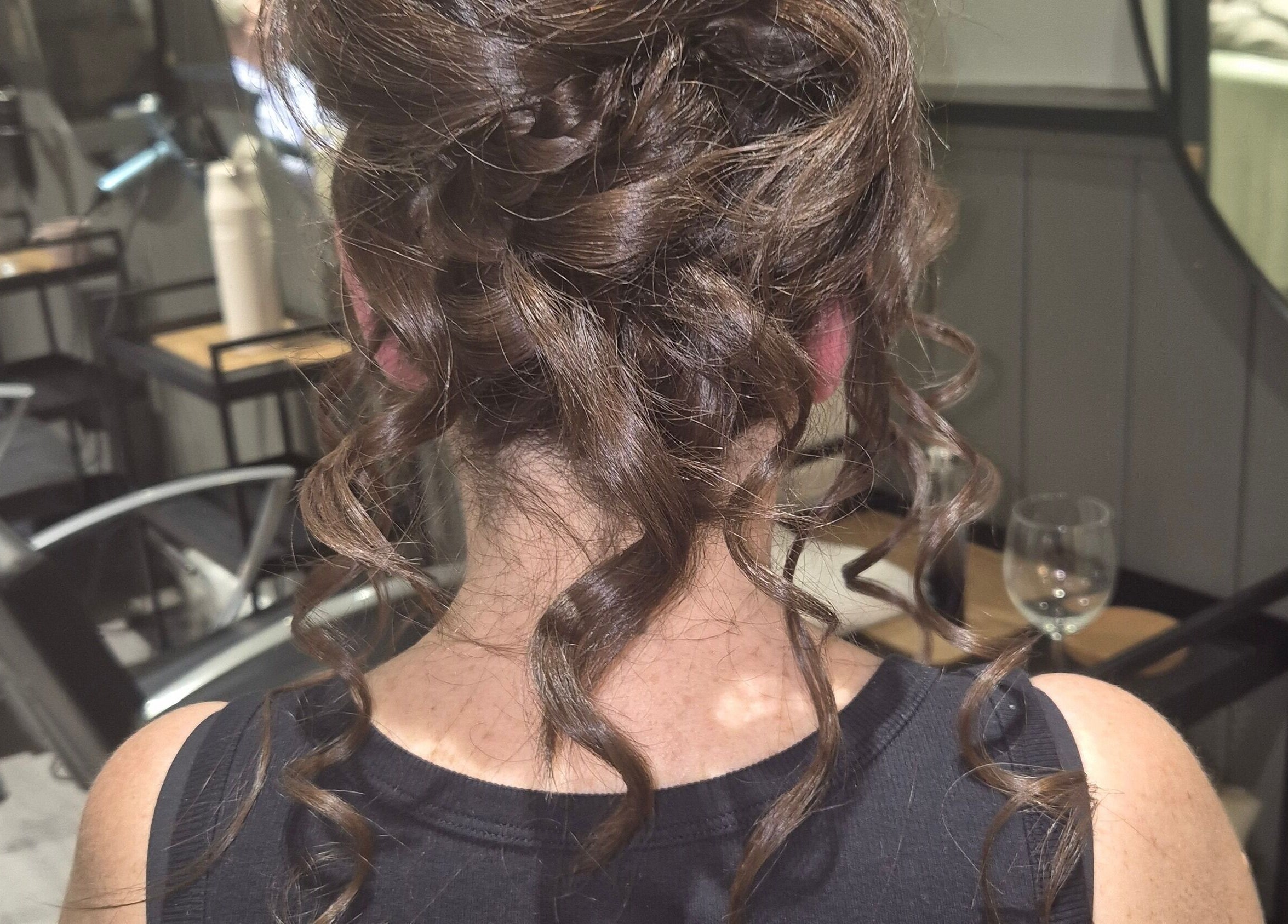 Stunning hairstyle at Salon De Lyla, Ludgershall, England, GB showcases intricate curls and elegant updo.