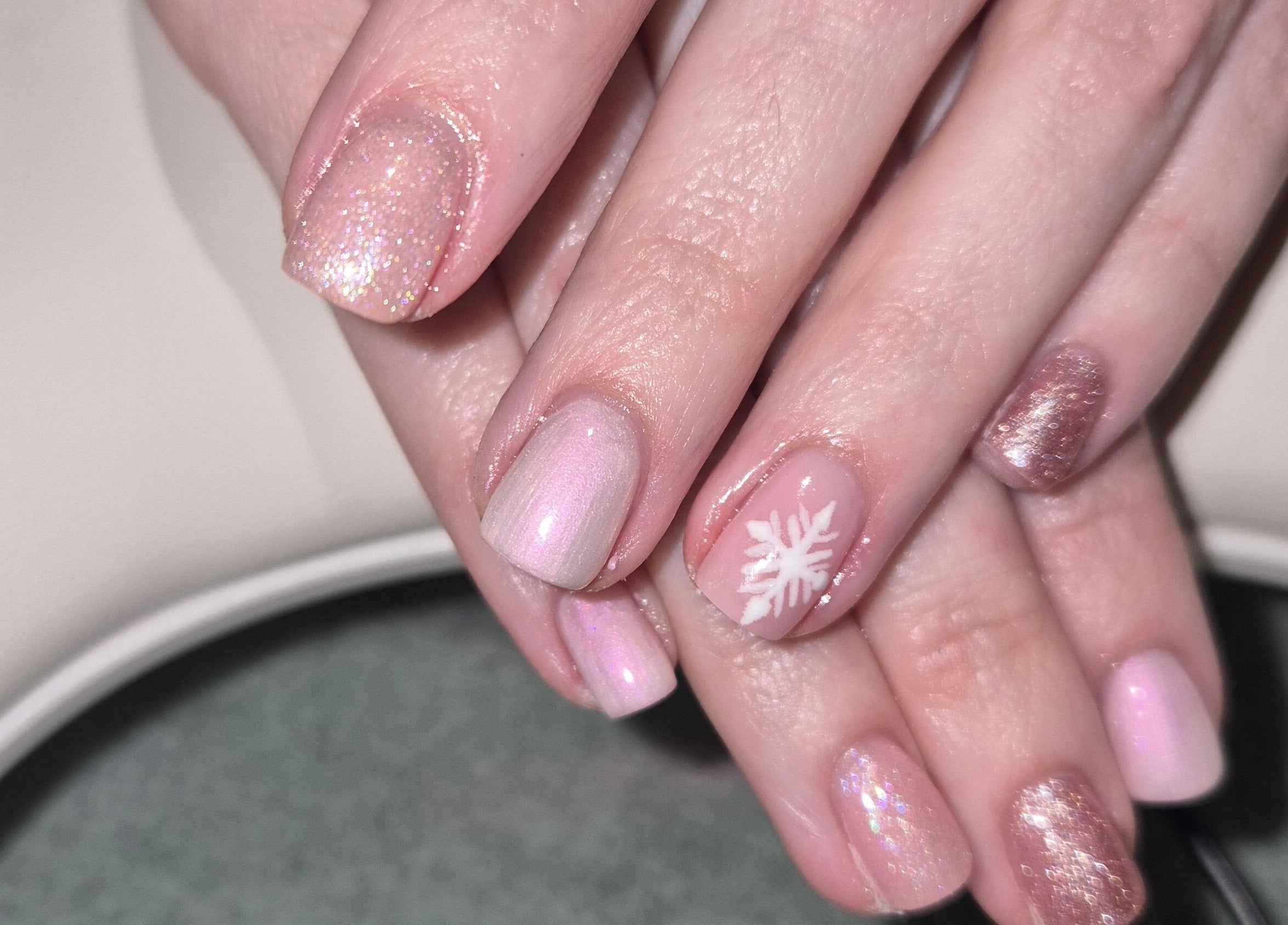 Glittery nail art at Salon De Lyla, Ludgershall, England, GB, showcasing a chic winter design.
