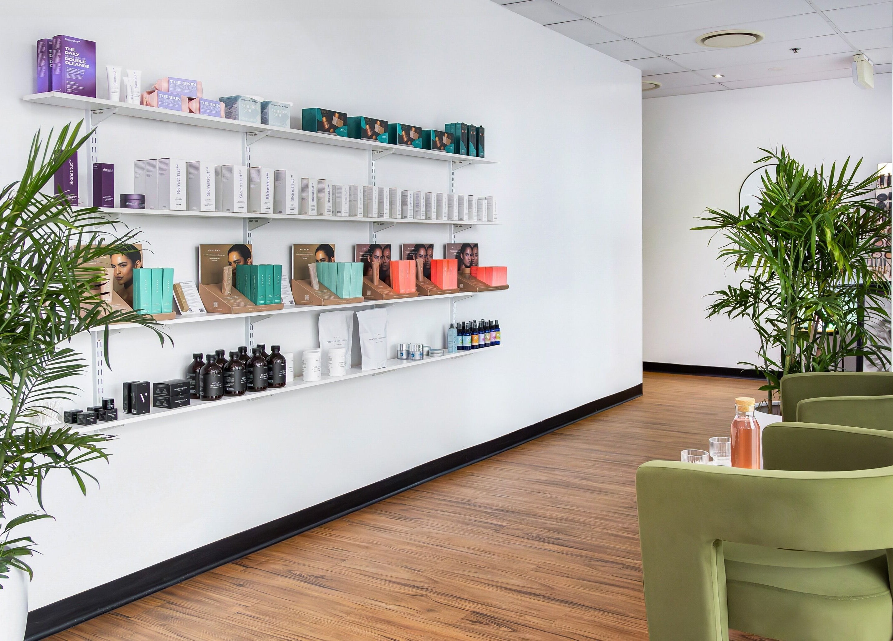 Face Magic Medispa in Coolangatta, Queensland, AU, displays elegant skincare products on modern shelves.