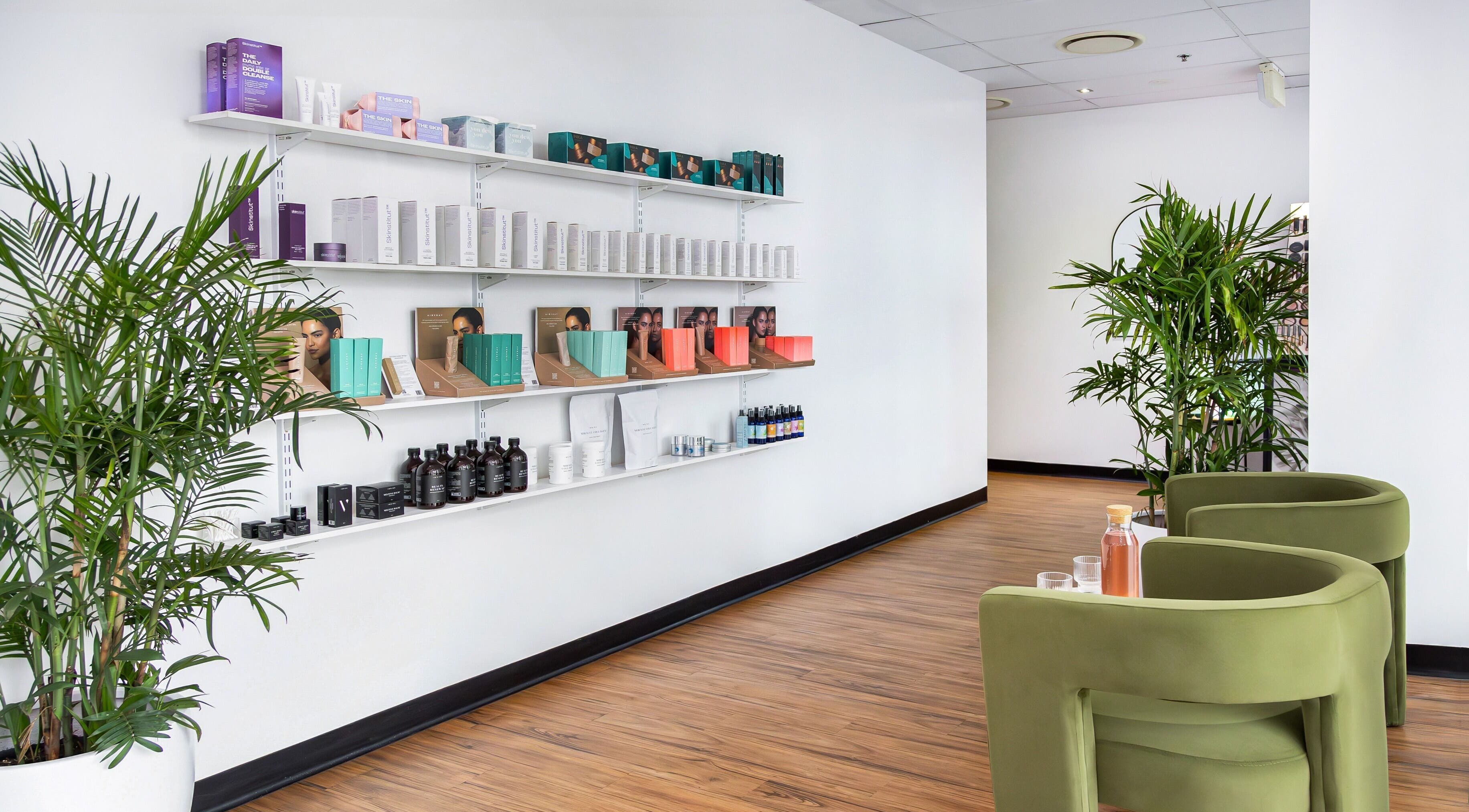 Face Magic Medispa in Coolangatta, Queensland, AU, displays elegant skincare products on modern shelves.