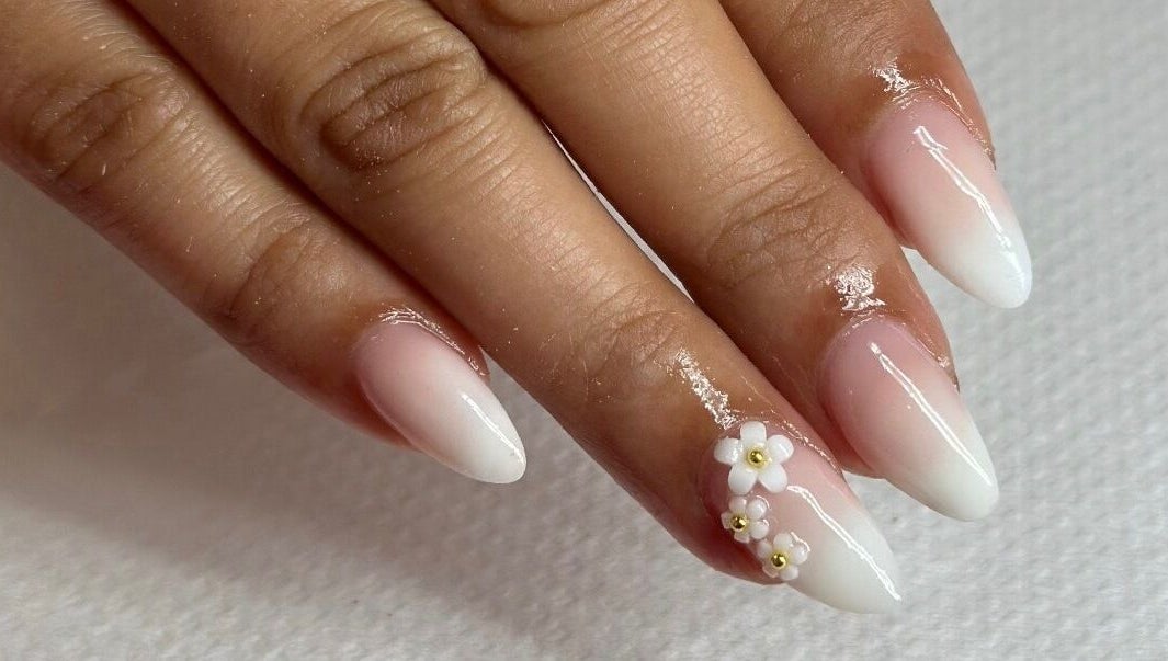 Elegant ombre nails with flower design at Pamper Me Pink, Cape Town, Western Cape, ZA.