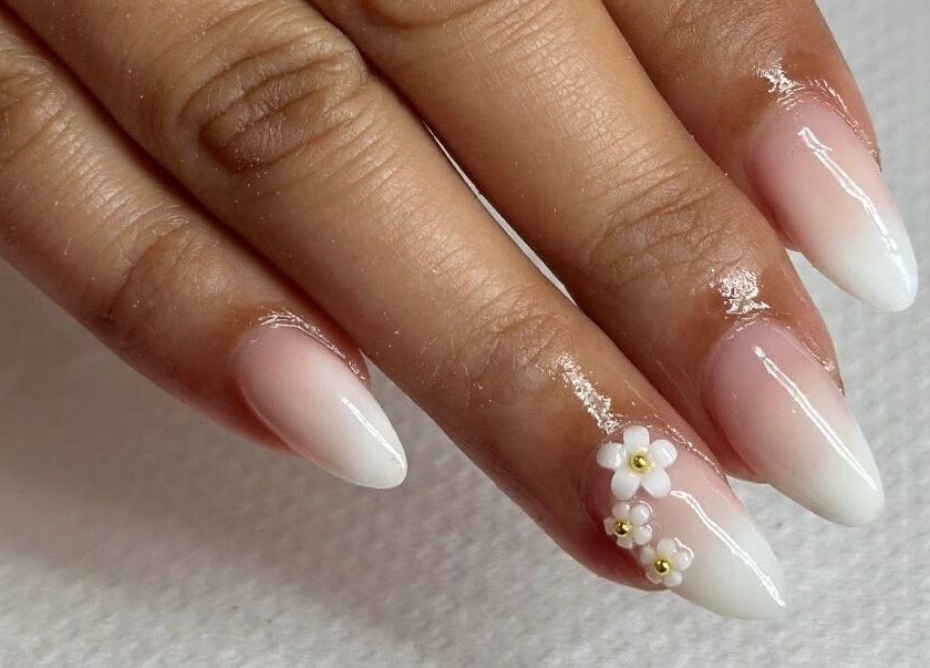 Elegant ombre nails with flower design at Pamper Me Pink, Cape Town, Western Cape, ZA.