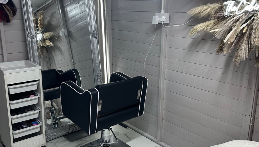 Elegant salon chair and mirror setup at TheCabinOfLuxxe, Bolton, England, GB.