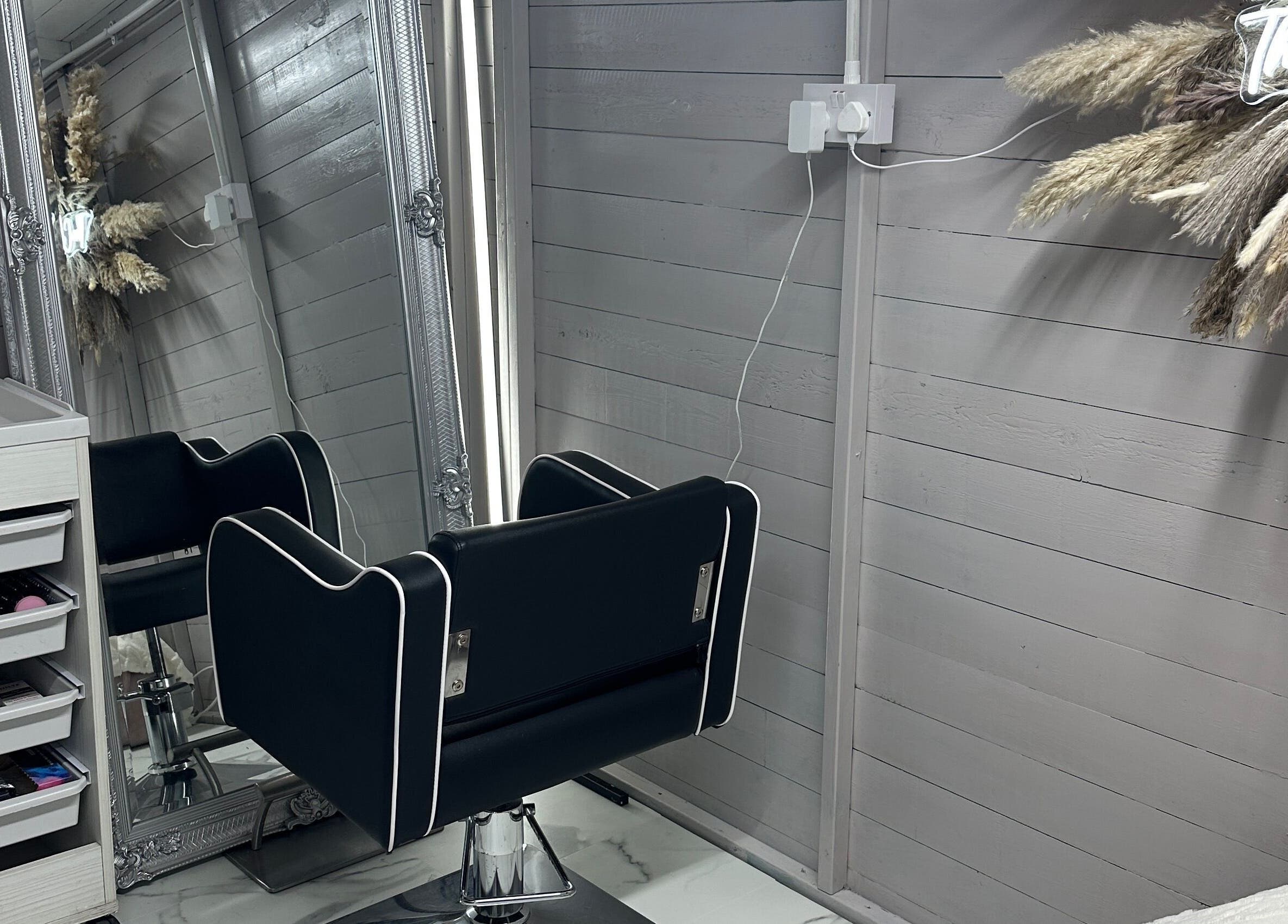 Elegant salon chair and mirror setup at TheCabinOfLuxxe, Bolton, England, GB.