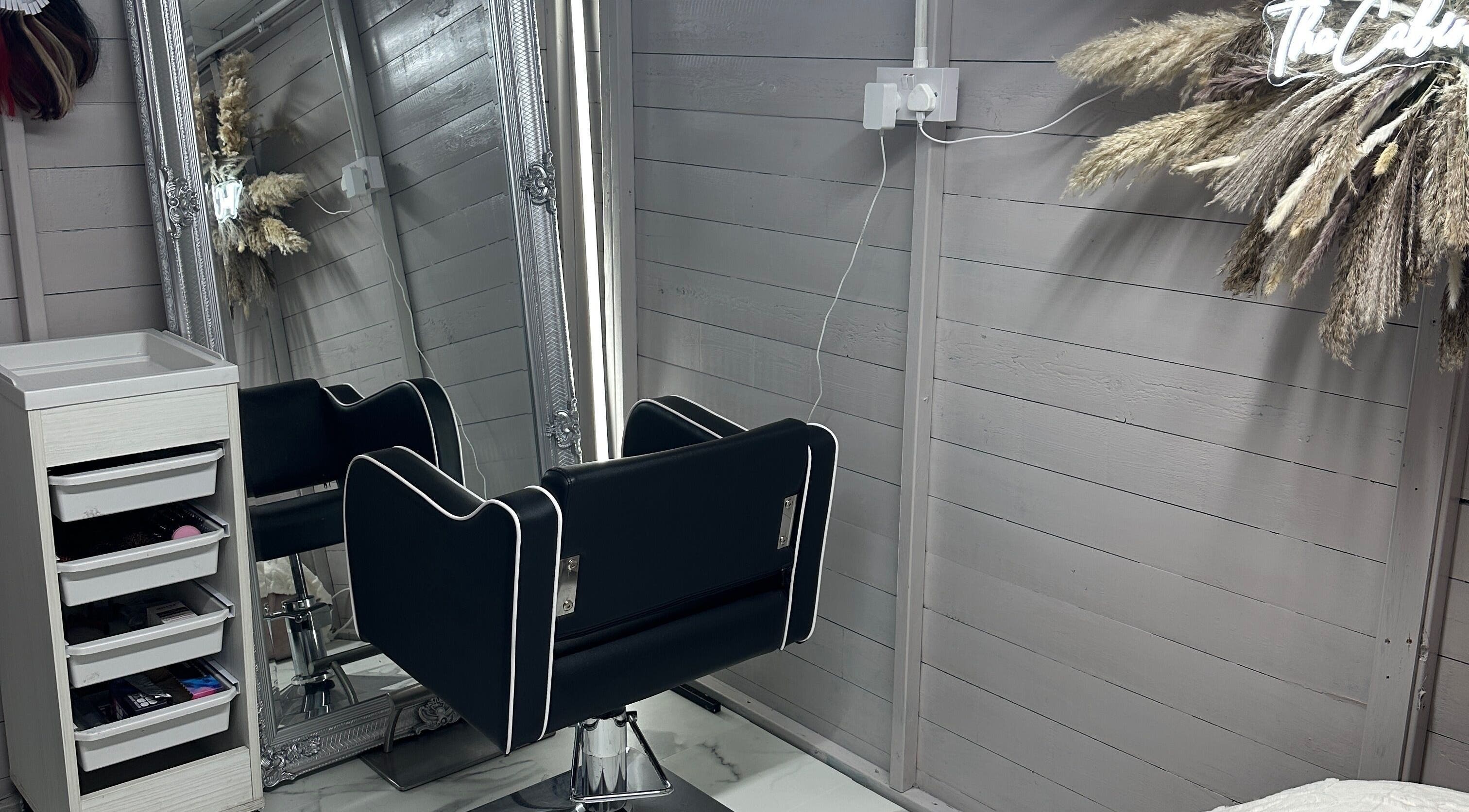 Elegant salon chair and mirror setup at TheCabinOfLuxxe, Bolton, England, GB.