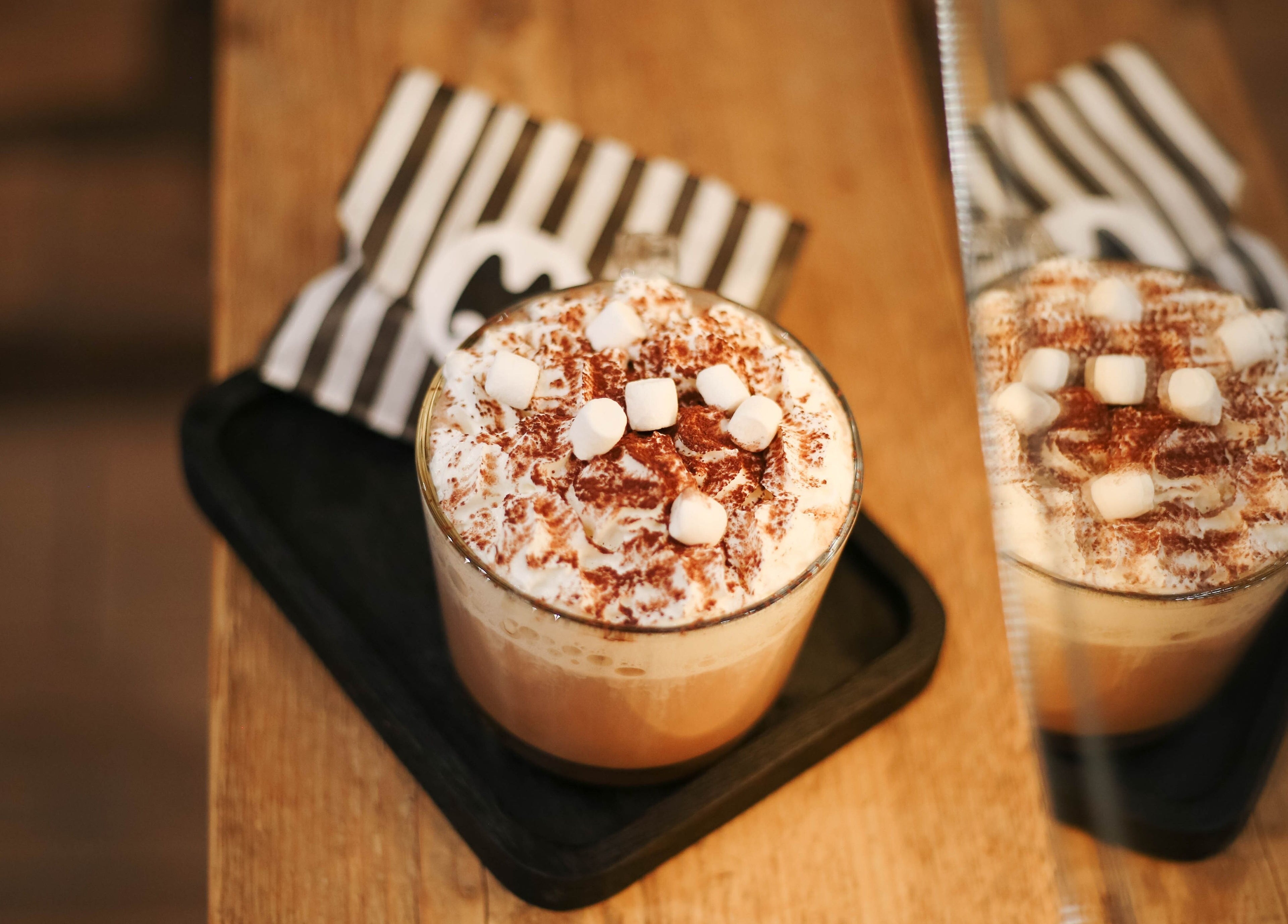 Delicious hot cocoa with whipped cream and marshmallows at Mane, Huncote, England, GB.