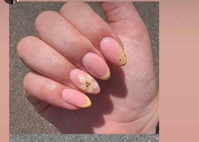 Elegant flower nail art at Ella Rose Nails, Witham, England, GB. Soft pink hues with detailed floral design.