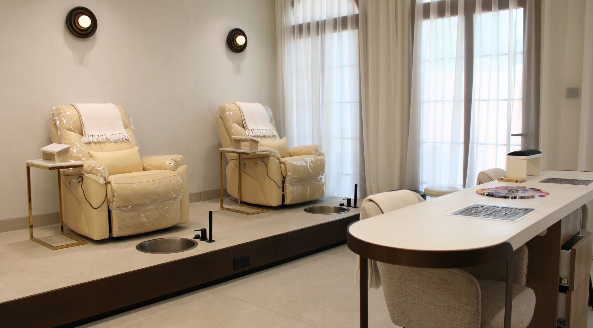 Elegant pedicure chairs at By Mikas Beauty Salon - Sole Proprietorship L.L.C., Abu Dhabi, Abu Dhabi, AE.