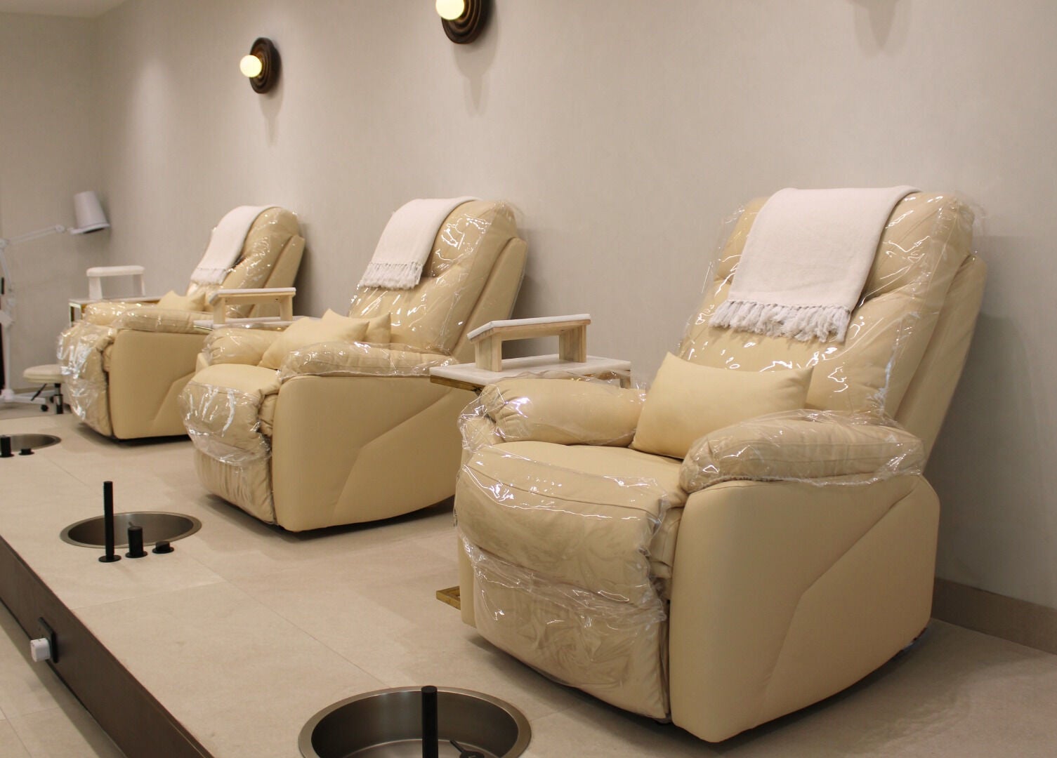 Elegant pedicure chairs at By Mikas Beauty Salon - Sole Proprietorship L.L.C. in Abu Dhabi, Abu Dhabi, AE.
