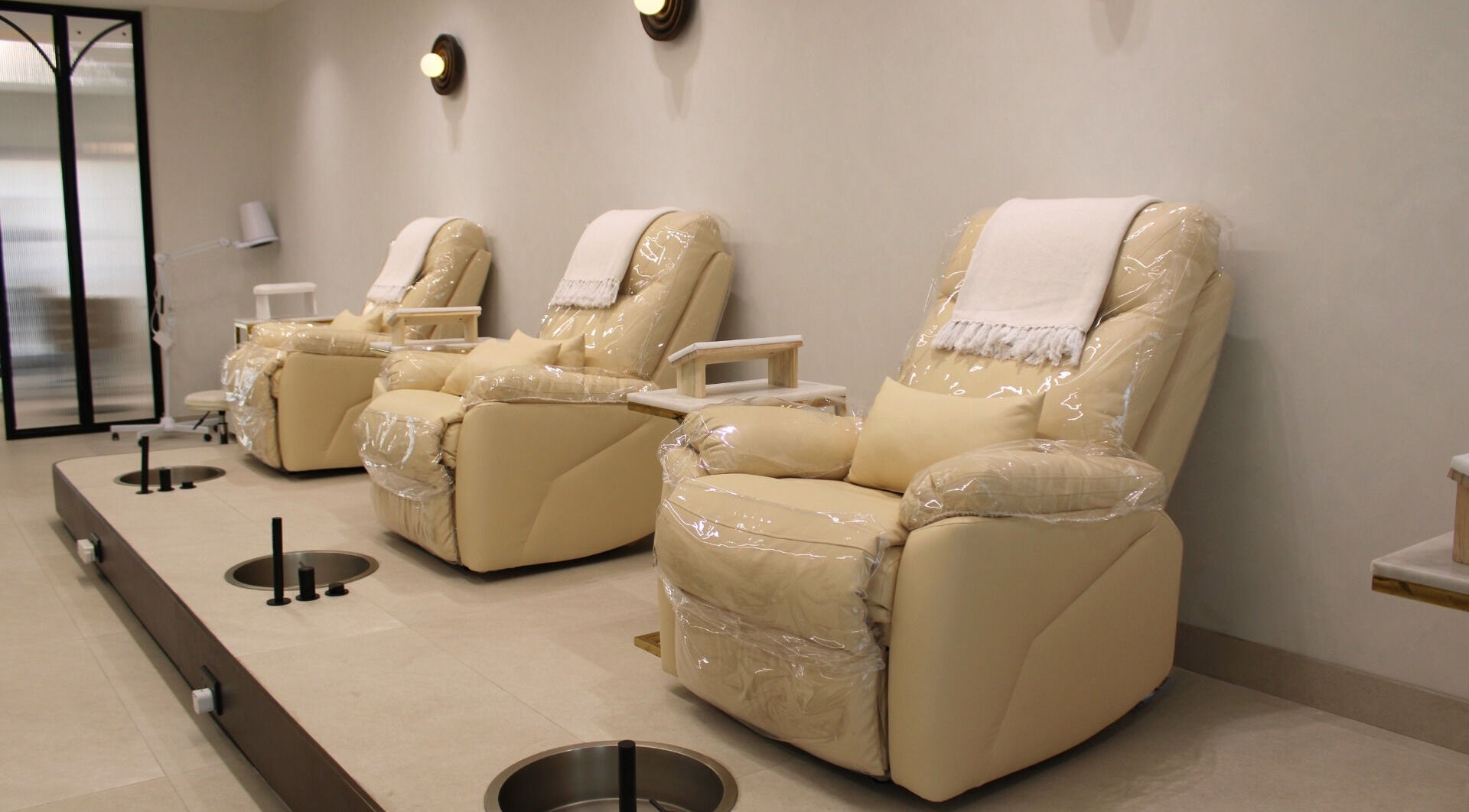 Elegant pedicure chairs at By Mikas Beauty Salon - Sole Proprietorship L.L.C. in Abu Dhabi, Abu Dhabi, AE.