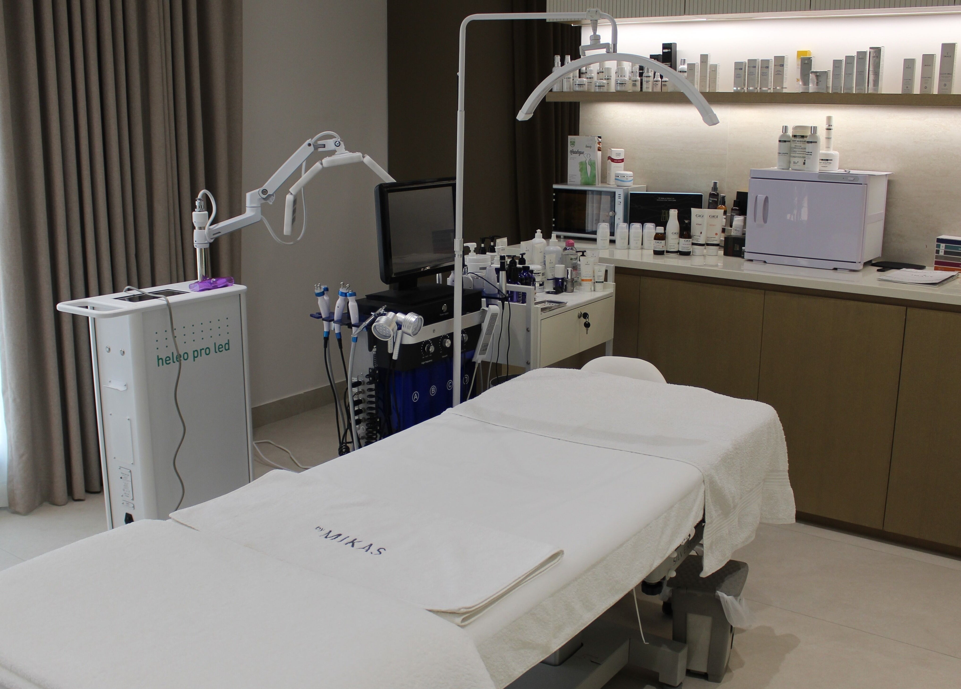 Luxurious spa room at By Mikas Beauty Salon - Sole Proprietorship L.L.C. in Abu Dhabi, AE, featuring modern skincare equipment.