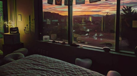 Cozy massage room at Medspa Medical Massage with sunset view in Roanoke, Virginia, US.