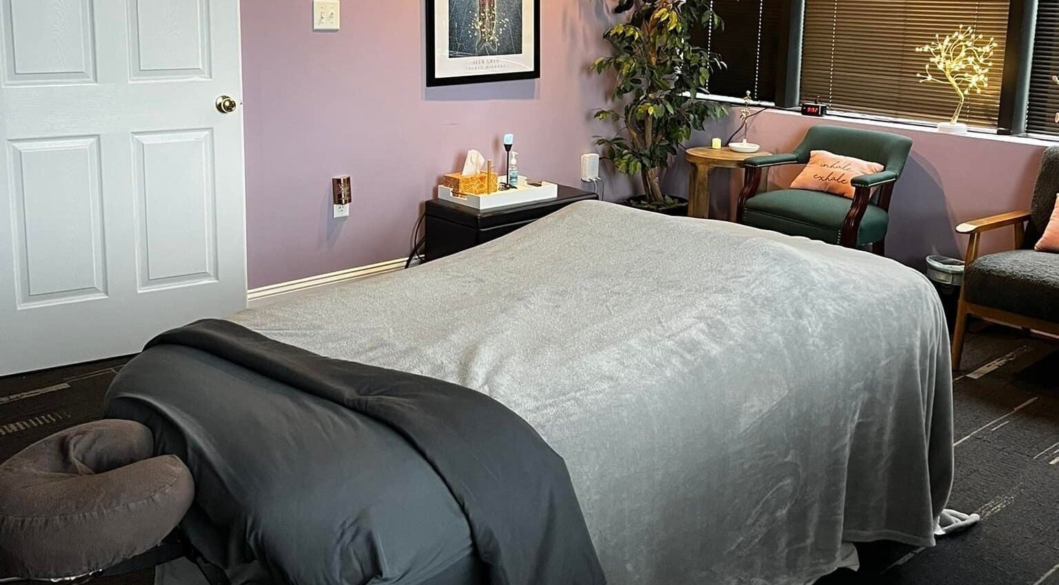 Cozy massage room at Medspa Medical Massage, Roanoke, Virginia, US, with serene decor and a comfortable massage table.