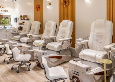 Elegant pedicure stations at Lover's Nails Spa Kissimmee, Kissimmee, Florida, US offer a luxurious ambiance.