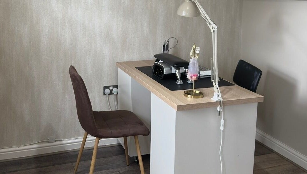 Modern nail table setup at Ashton Artistry in Brandon, England, GB, featuring sleek design and efficient lighting.