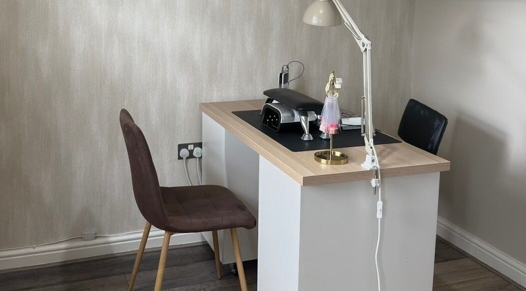 Modern nail table setup at Ashton Artistry in Brandon, England, GB, featuring sleek design and efficient lighting.