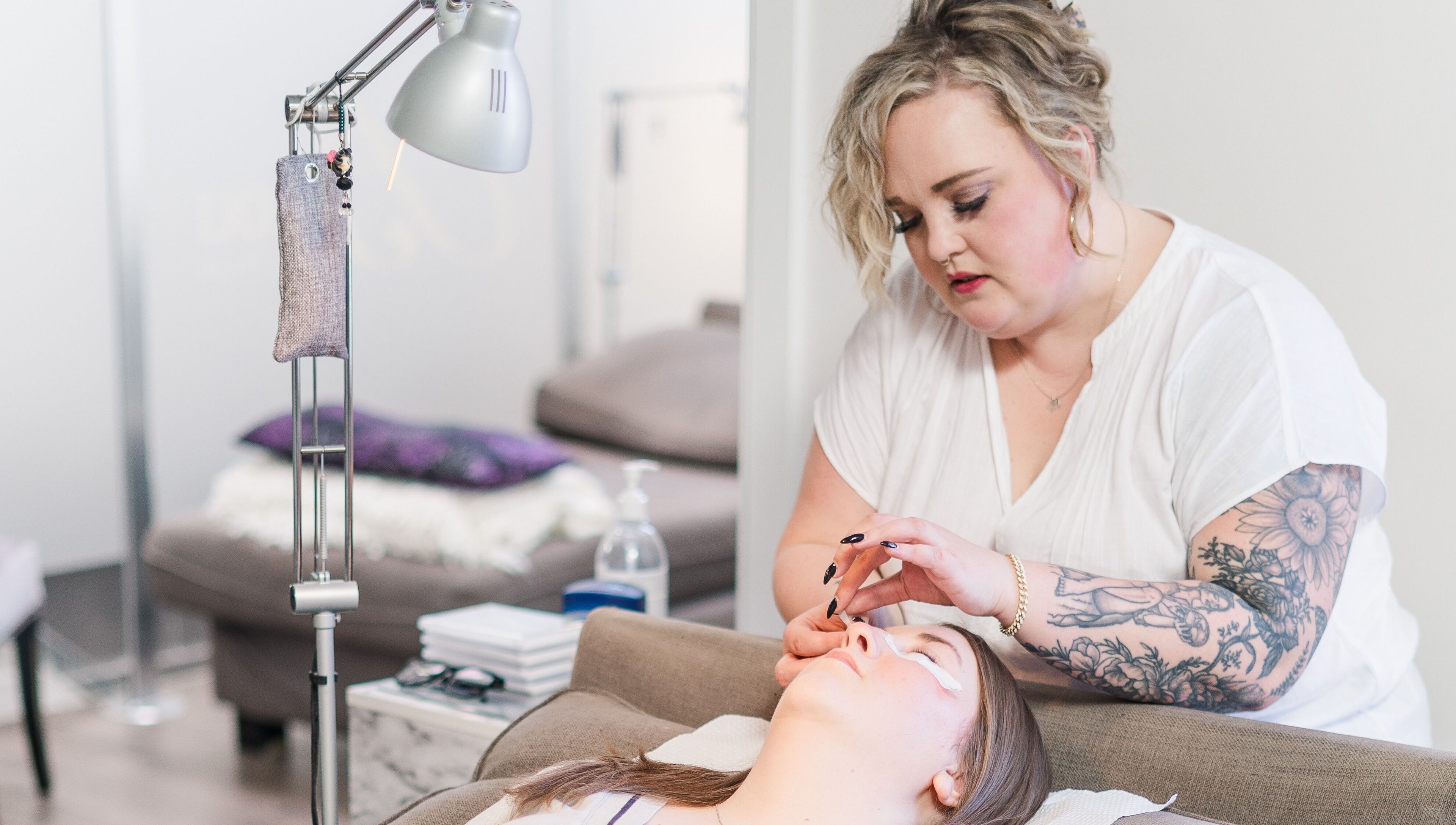 Expert applying eyelash extensions at Bizou Lash Studio in Sherwood Park, Alberta, CA.