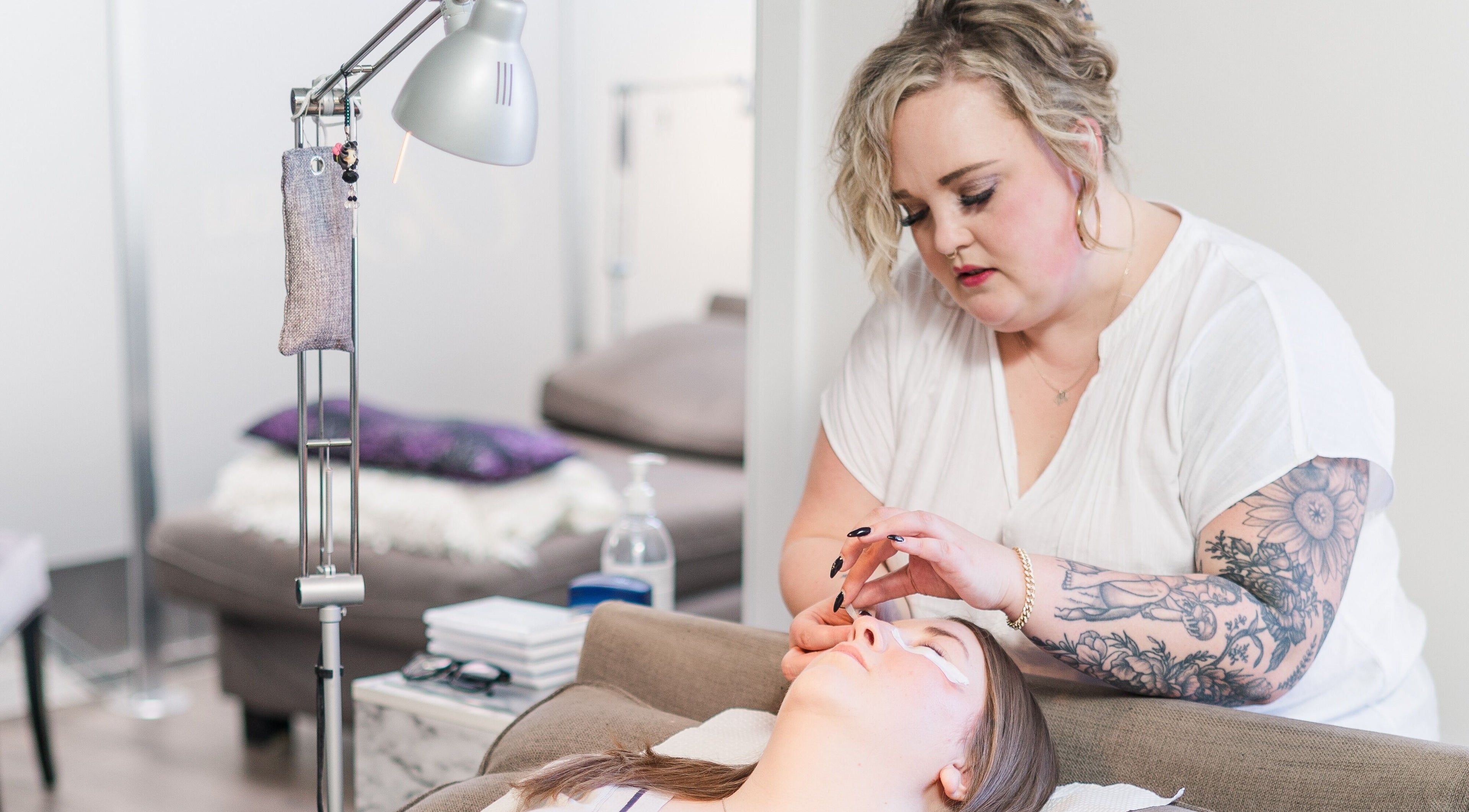 Expert applying eyelash extensions at Bizou Lash Studio in Sherwood Park, Alberta, CA.