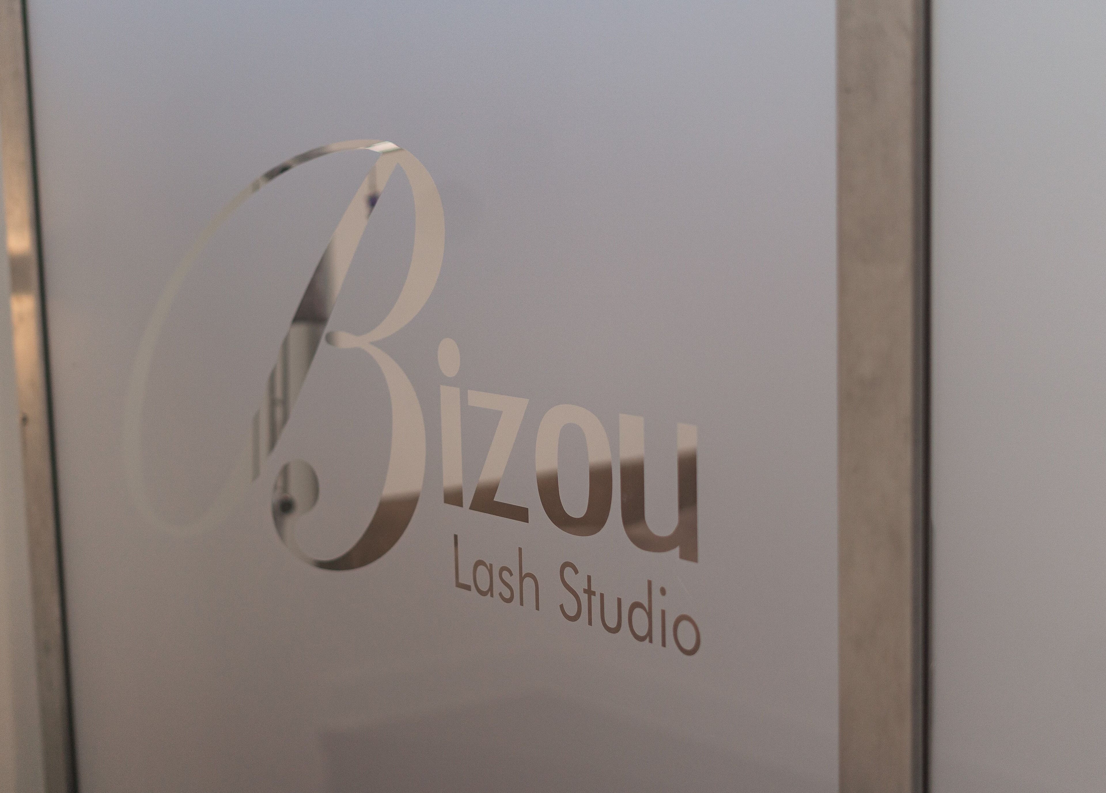 Elegant glass door with Bizou Lash Studio logo in Sherwood Park, Alberta, CA.