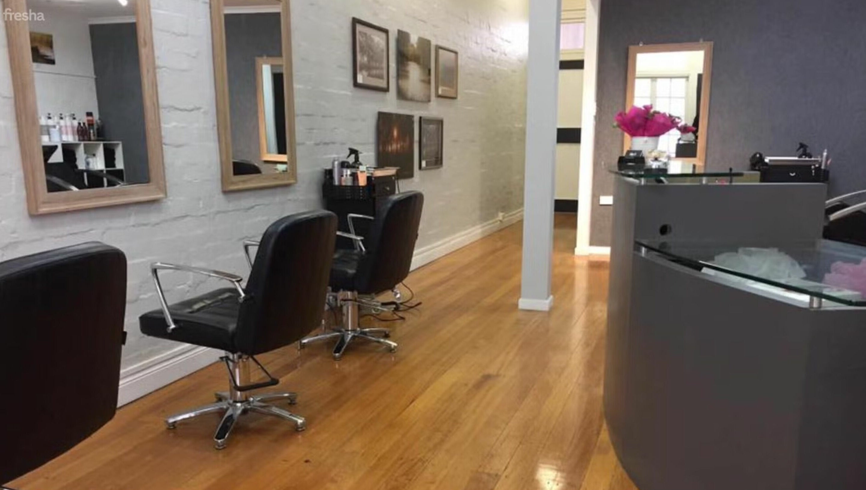 Elegant interior of Salon at 72 on Warwick, Queensland, AU with stylish chairs and modern decor.