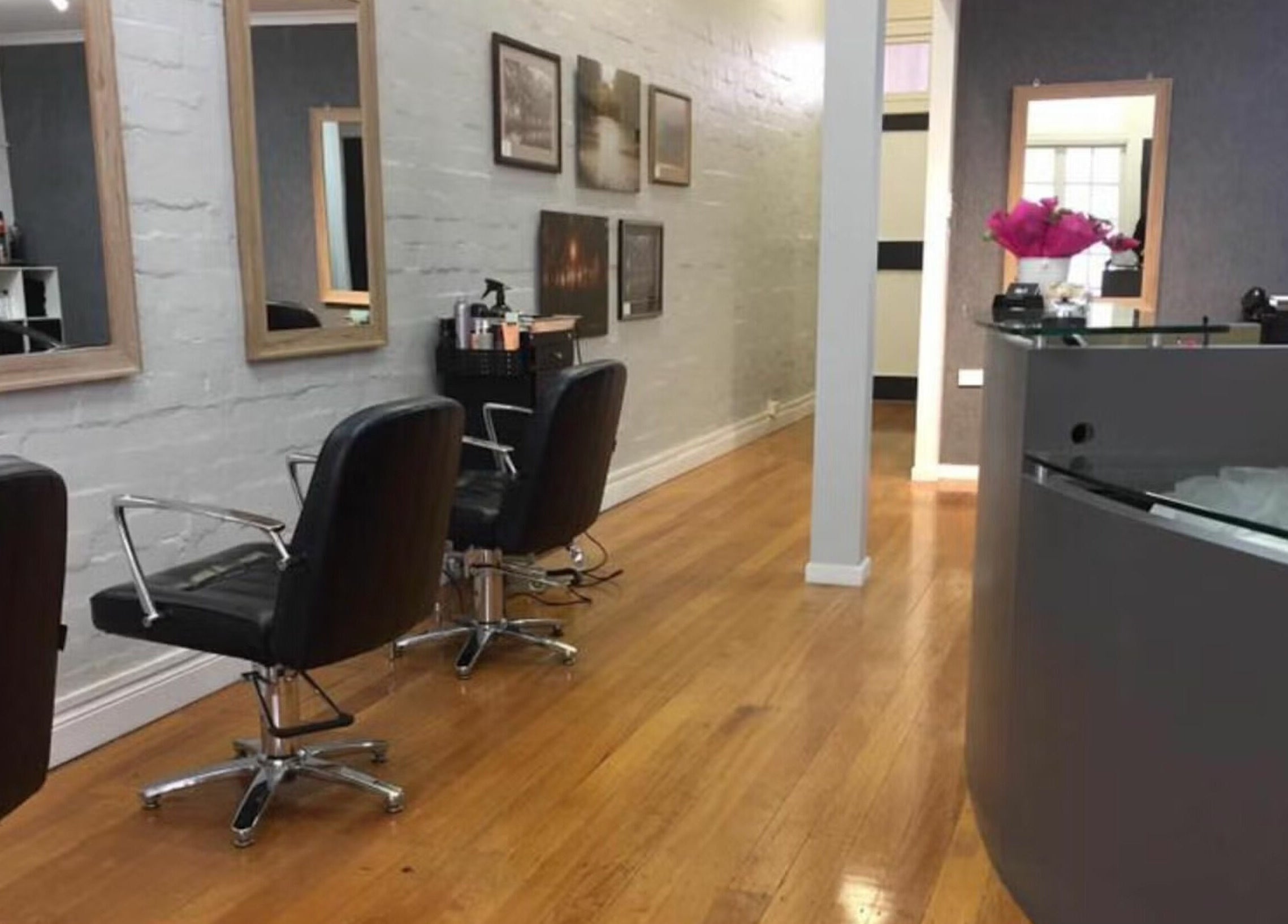 Elegant interior of Salon at 72 on Warwick, Queensland, AU with stylish chairs and modern decor.