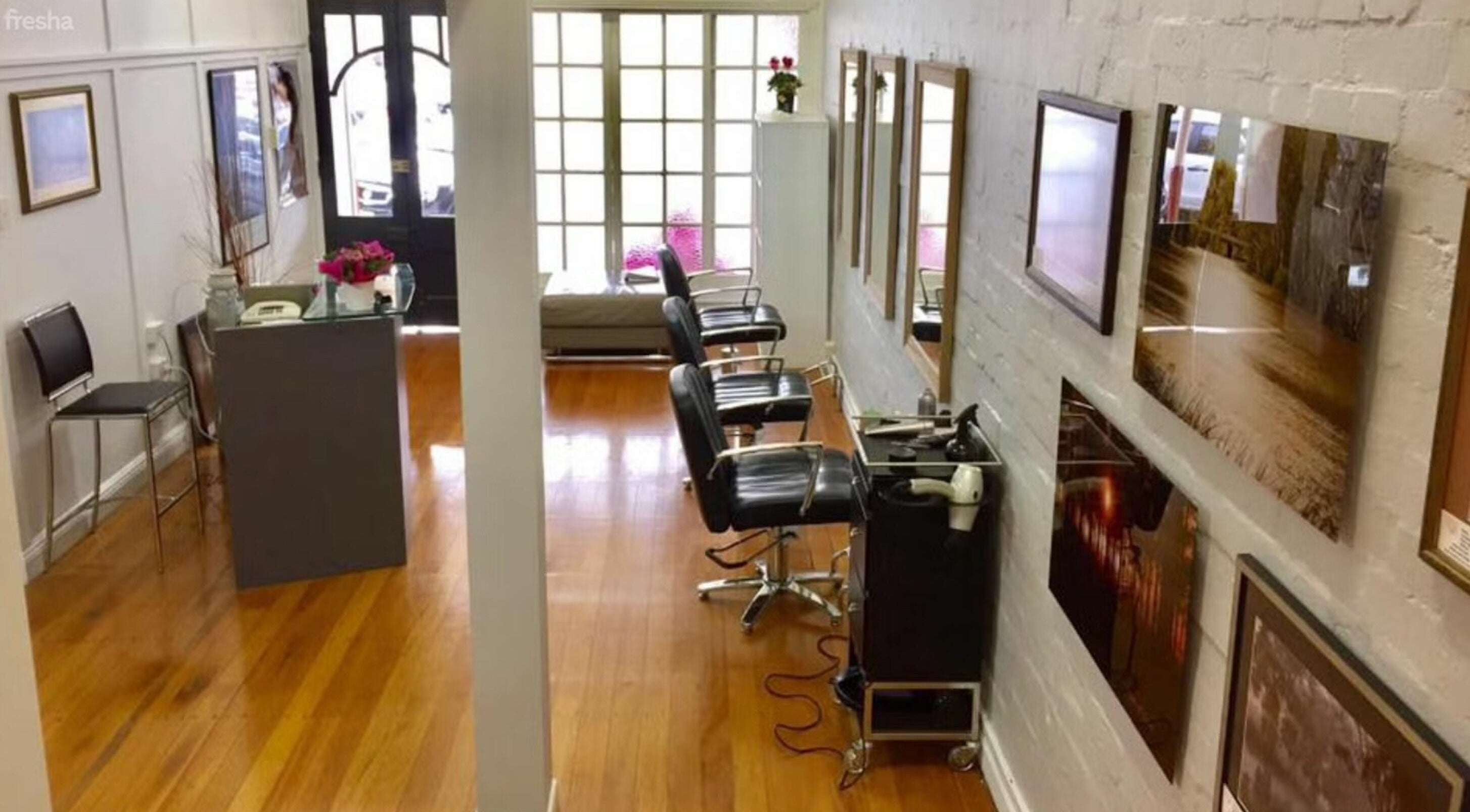Salon at 72 interior view with sleek styling chairs, Warwick, Queensland, AU reflecting modern elegance.