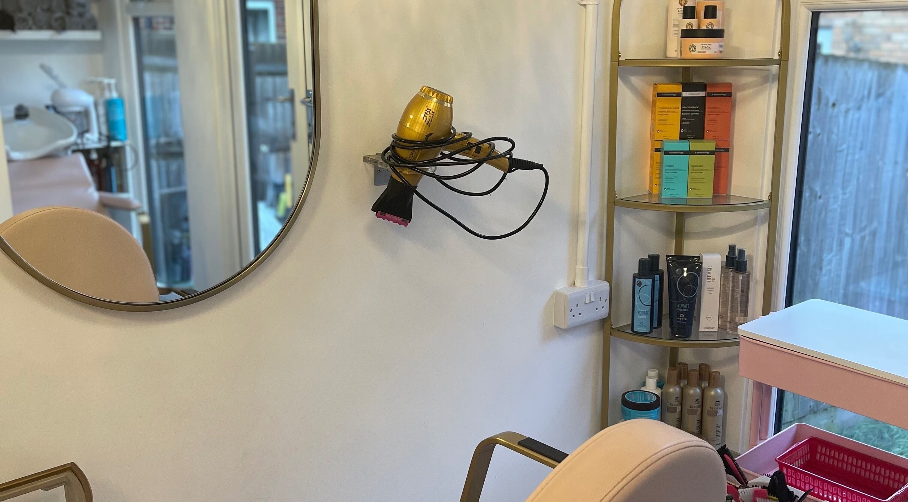 Modern beauty station with products at Beautè Dolls, Luton, England, GB showcasing elegance and style.