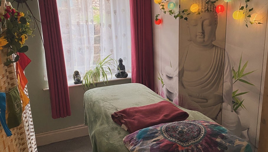 A tranquil therapy room at ReflexiveSole Holistic Therapies, Weston-super-mare, England, GB with soothing decor.