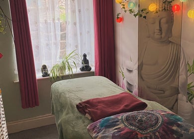 A tranquil therapy room at ReflexiveSole Holistic Therapies, Weston-super-mare, England, GB with soothing decor.