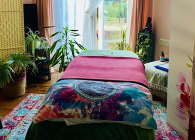 Inviting therapy room at ReflexiveSole Holistic Therapies, Weston-super-mare, England, GB with vibrant decor.