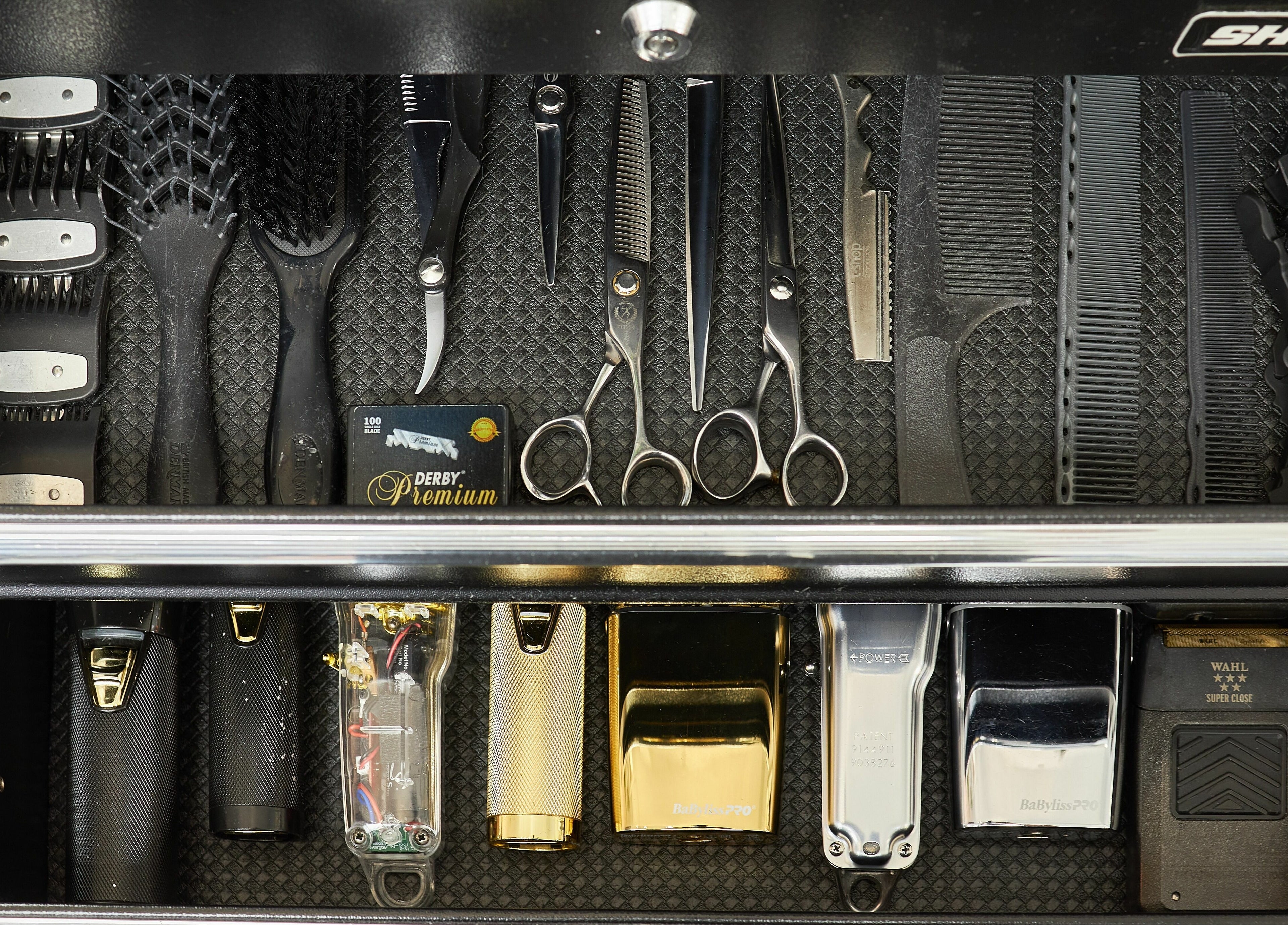 Professional hairstyling tools in a drawer at Aloyh Studio, East Melbourne, Victoria, AU.