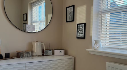 Sophisticated interior of Braw Nails, Livingston, Scotland, GB showcasing a stylish mirror and elegant decor.