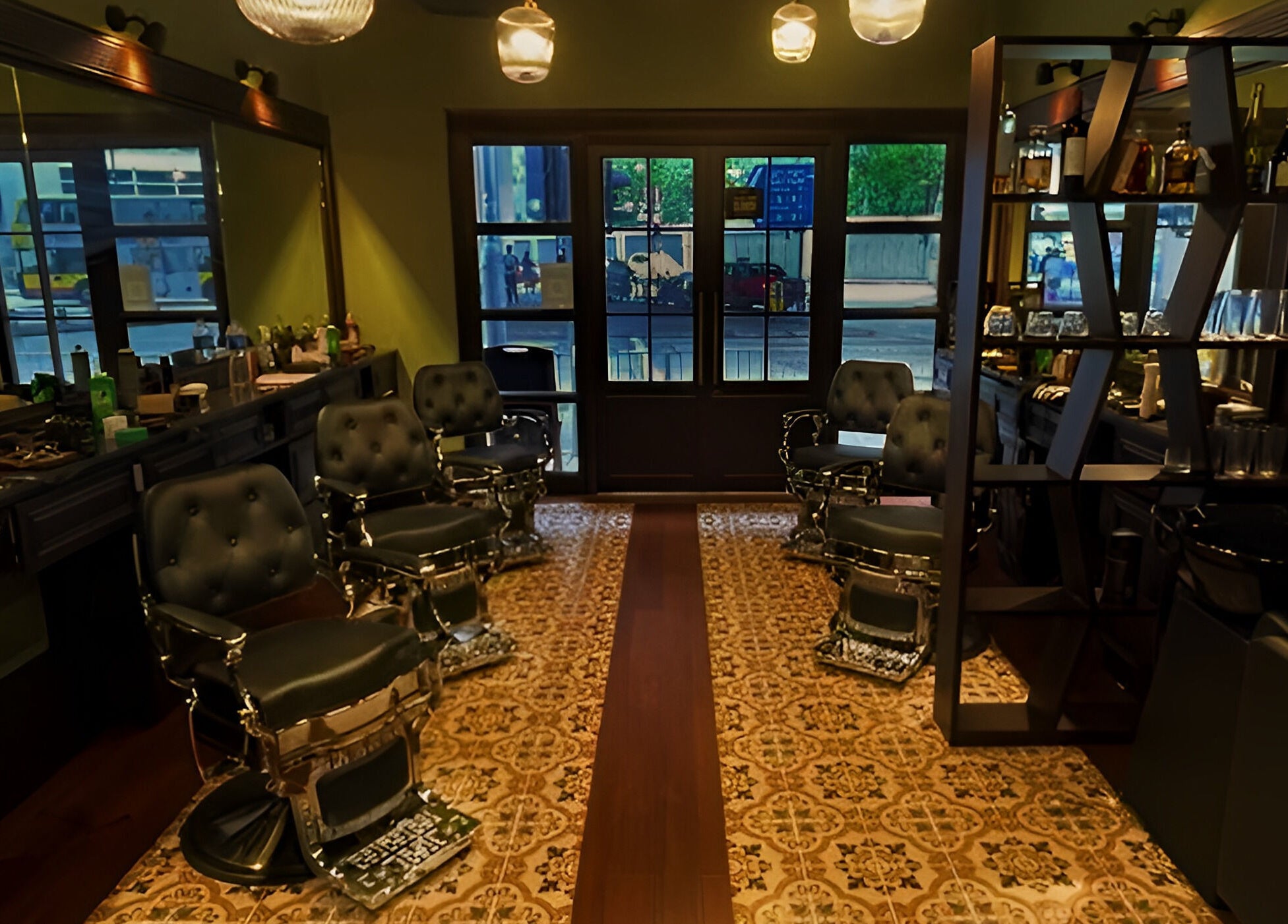 Elegant interior of The Suns Barbershop in 香港島, 香港島, HK showcasing vintage chairs and sleek decor.