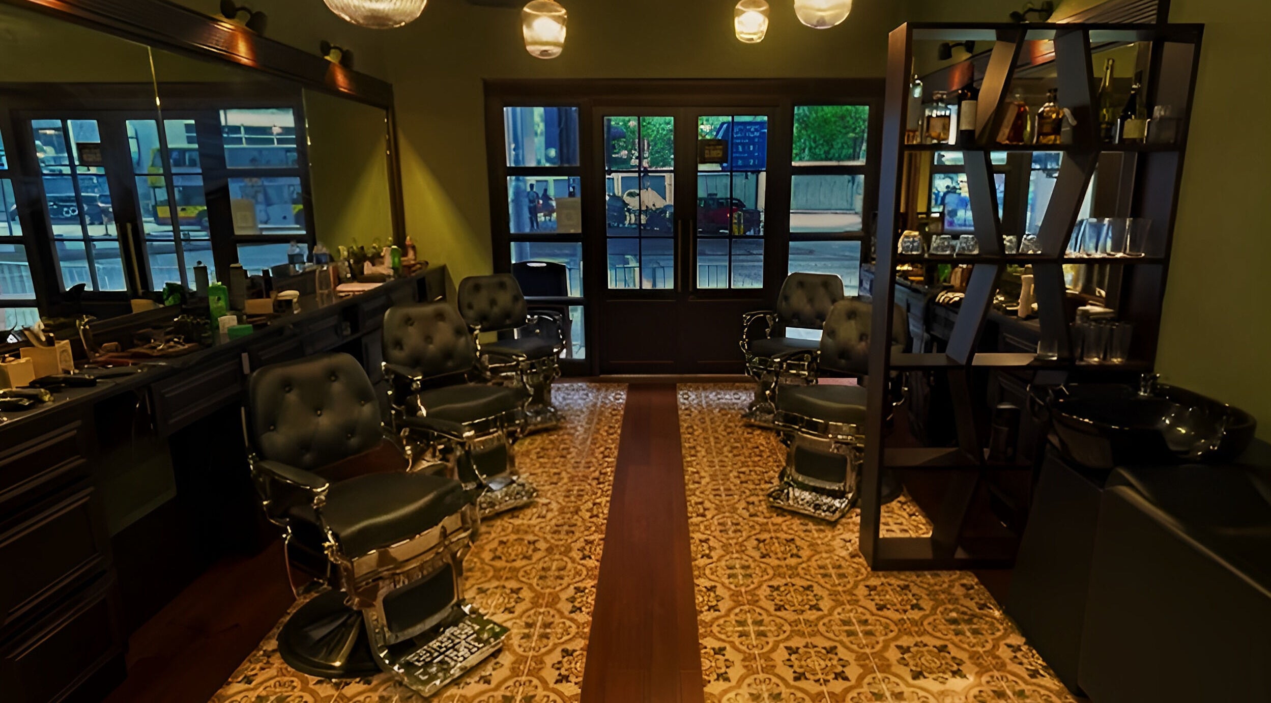 Elegant interior of The Suns Barbershop in 香港島, 香港島, HK showcasing vintage chairs and sleek decor.