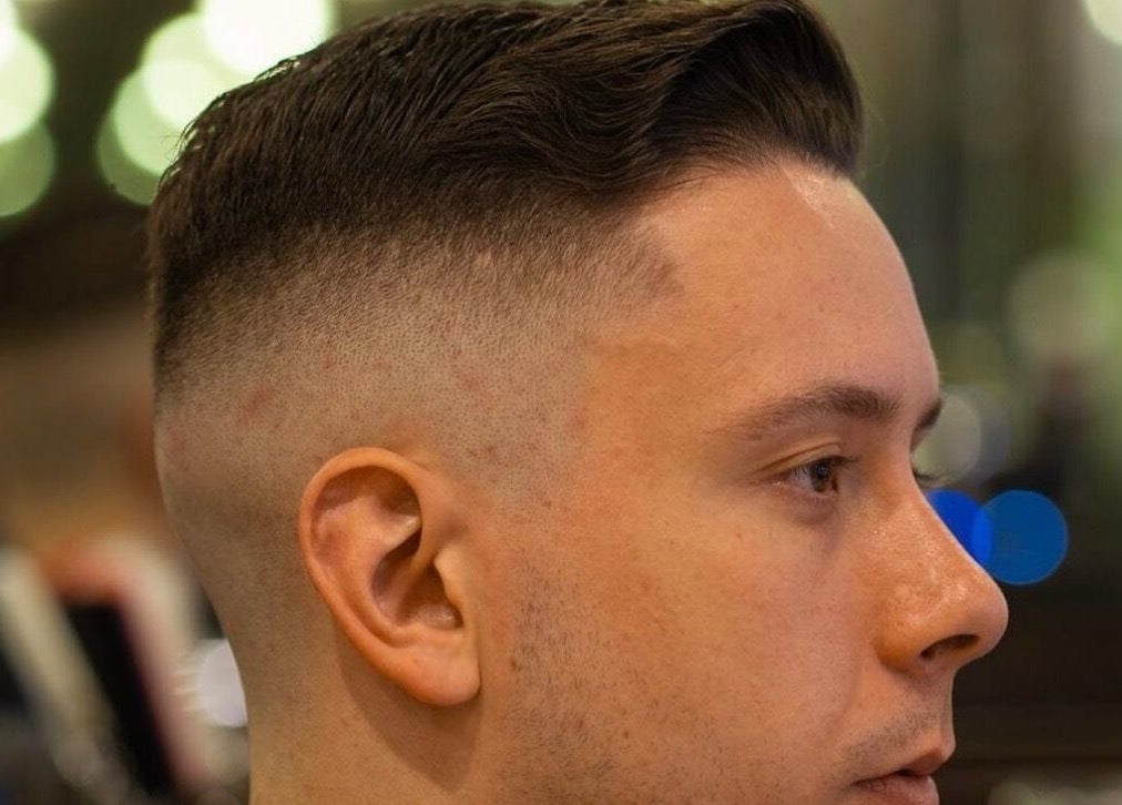 Close-up of a fresh fade haircut at The Suns Barbershop, 香港島, 香港島, HK, showcasing precise styling.