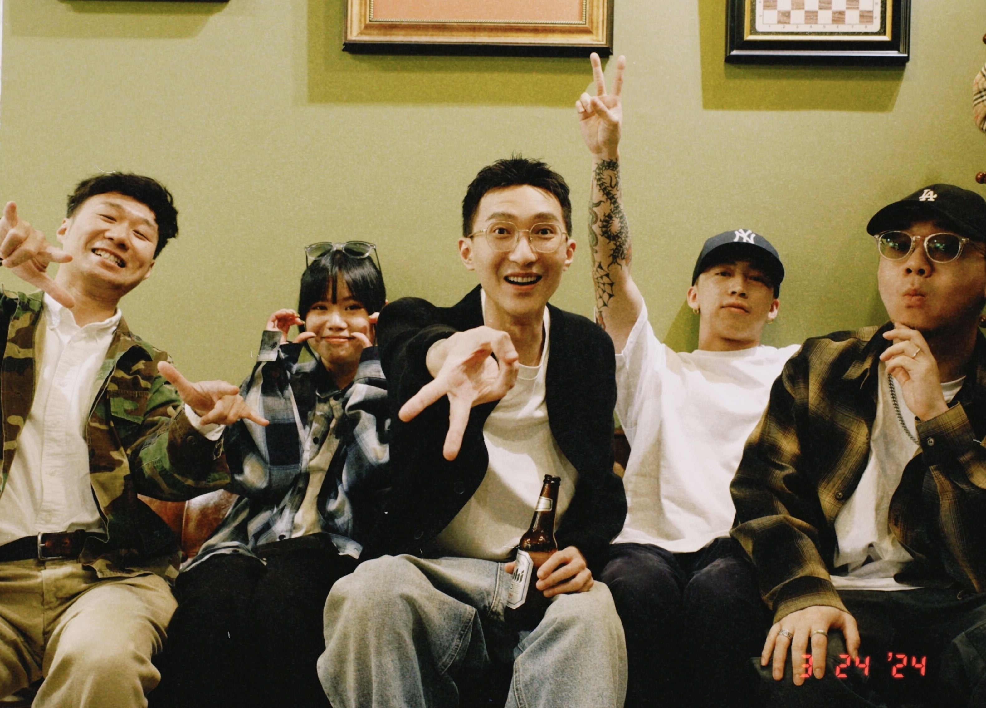 Group of friends enjoying a lively moment at The Suns Barbershop, 香港島, 香港島, HK.