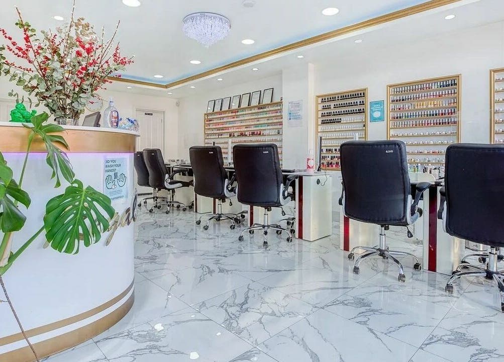 Chic interior of Regal Nails, Croydon, England, GB showcasing stylish nail service stations.
