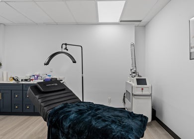 Beauty Matched Med Spa treatment room in Sarnia, Ontario, CA featuring modern equipment and sleek design.