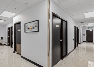 Chic hallway at Beauty Matched Med Spa in Sarnia, Ontario, CA with sleek design and ambient lighting.