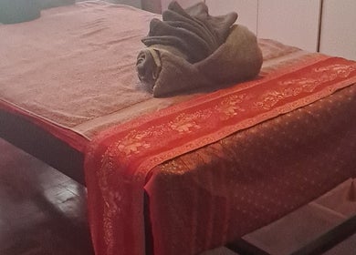 A tranquil massage table setup at Body & Soul Thai Day Spa, Randburg, Gauteng, ZA for ultimate relaxation.