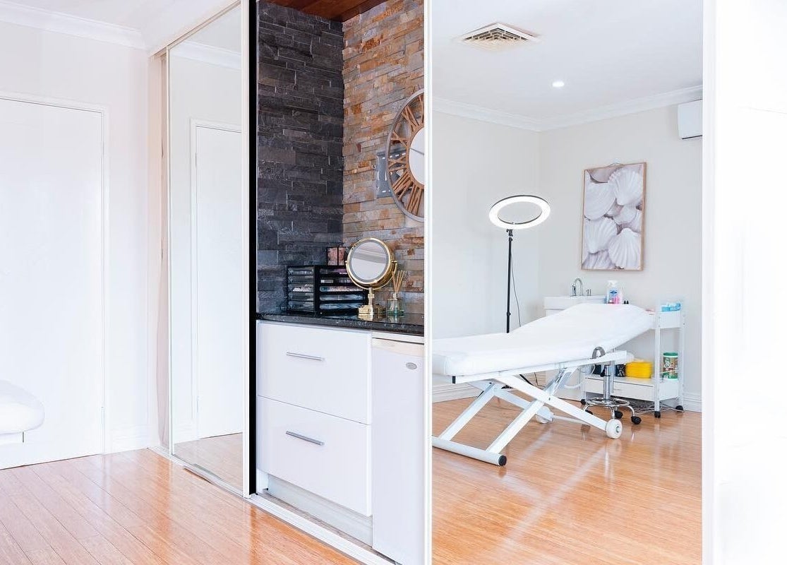 Modern treatment room at Rose Clinic in North Perth, Western Australia, AU with sleek decor and comfortable bed.