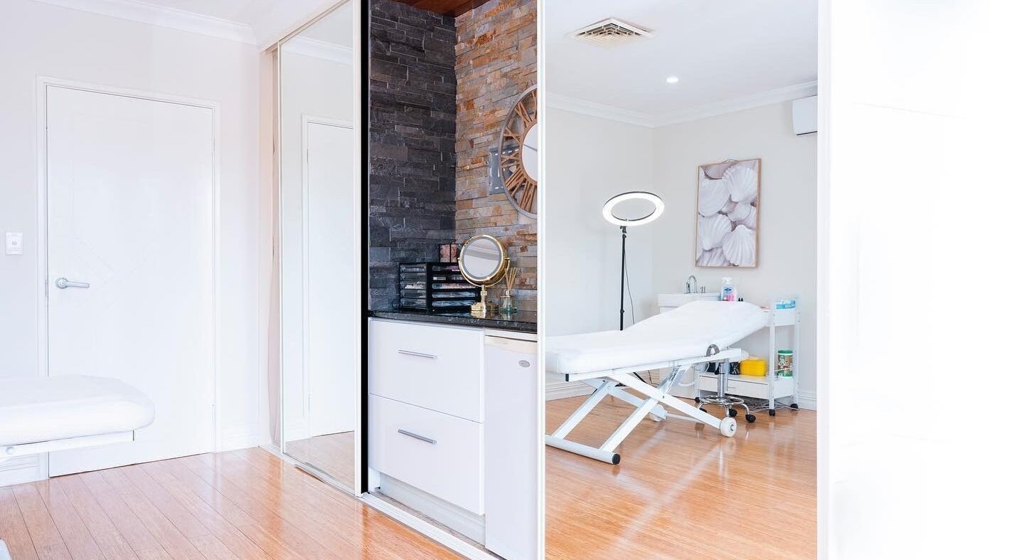 Modern treatment room at Rose Clinic in North Perth, Western Australia, AU with sleek decor and comfortable bed.