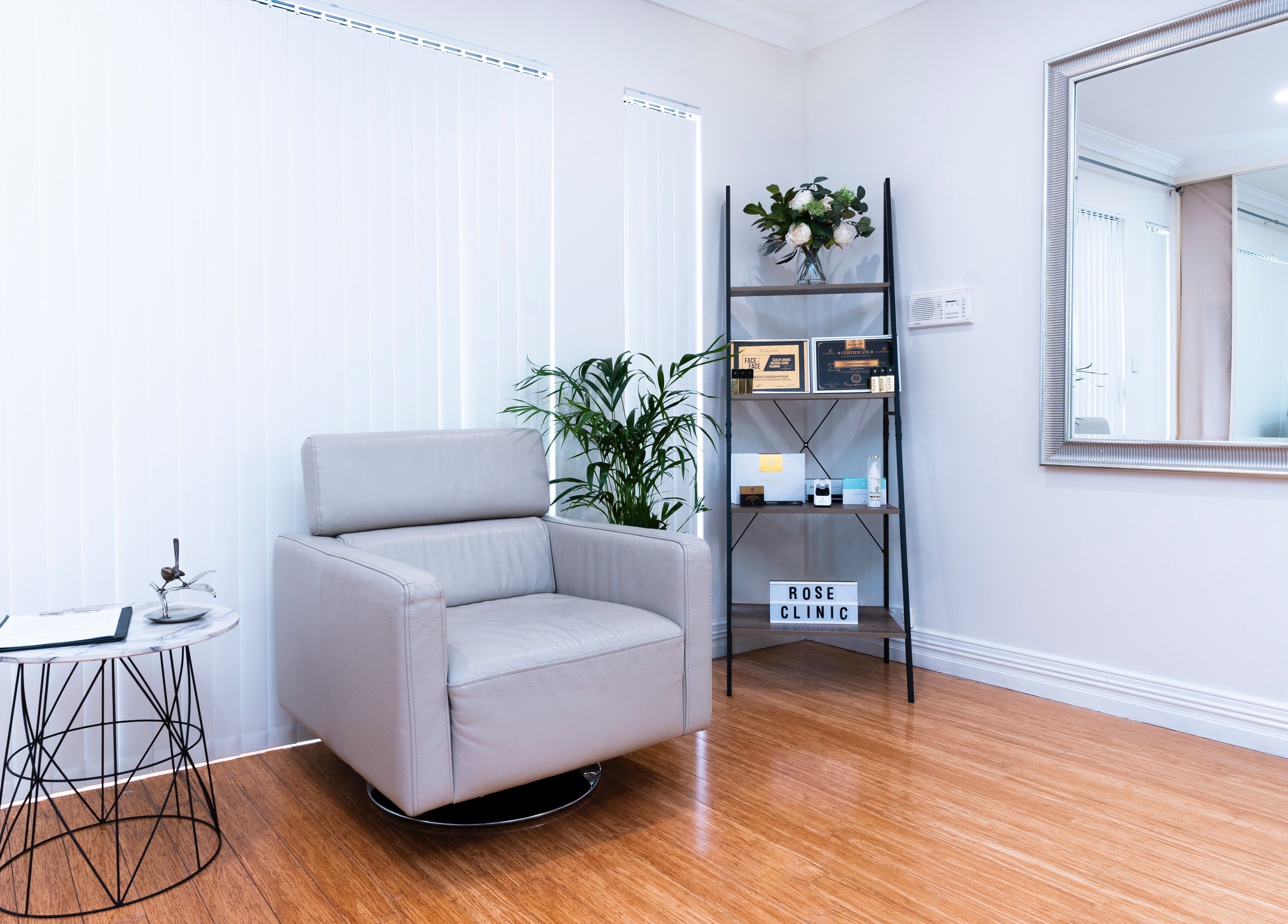 Relaxing lounge area at Rose Clinic, North Perth, Western Australia with elegant decor and natural light.
