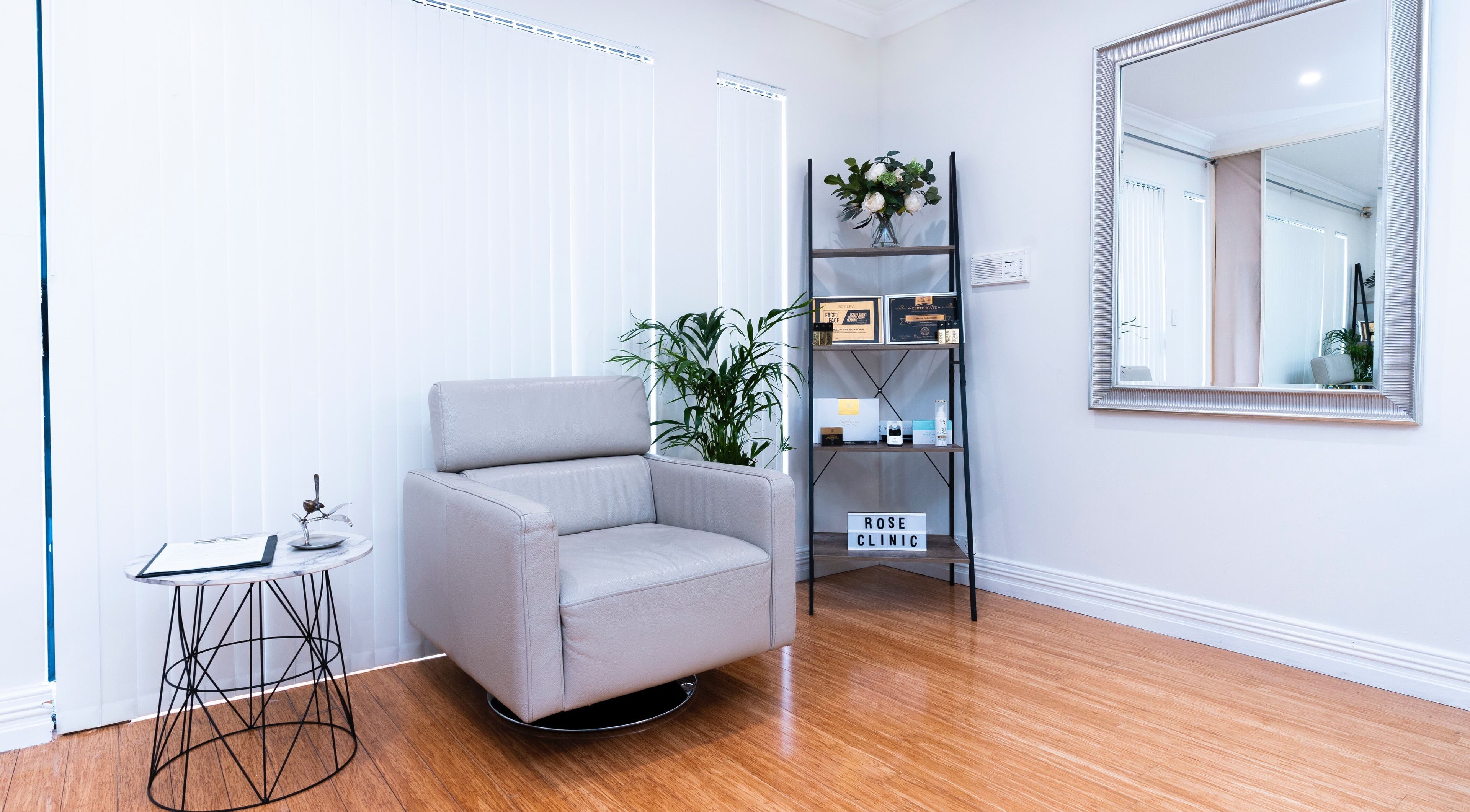 Relaxing lounge area at Rose Clinic, North Perth, Western Australia with elegant decor and natural light.