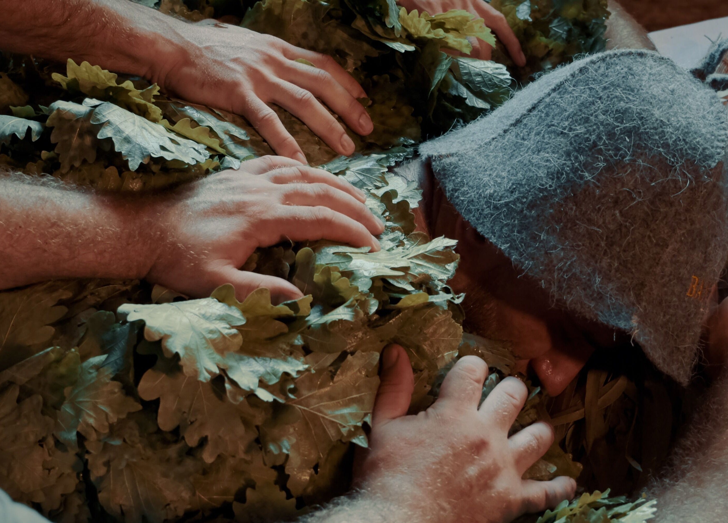 Traditional oak leaf spa treatment at Banya No.1 Tbilisi Private, Kiketi, GE, for relaxation and rejuvenation.