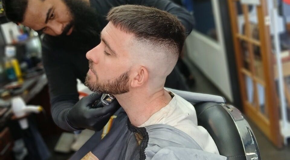 Skilled barber crafting a precise cut at Prestige Barber Lounge Caversham, Caversham, Western Australia, AU.