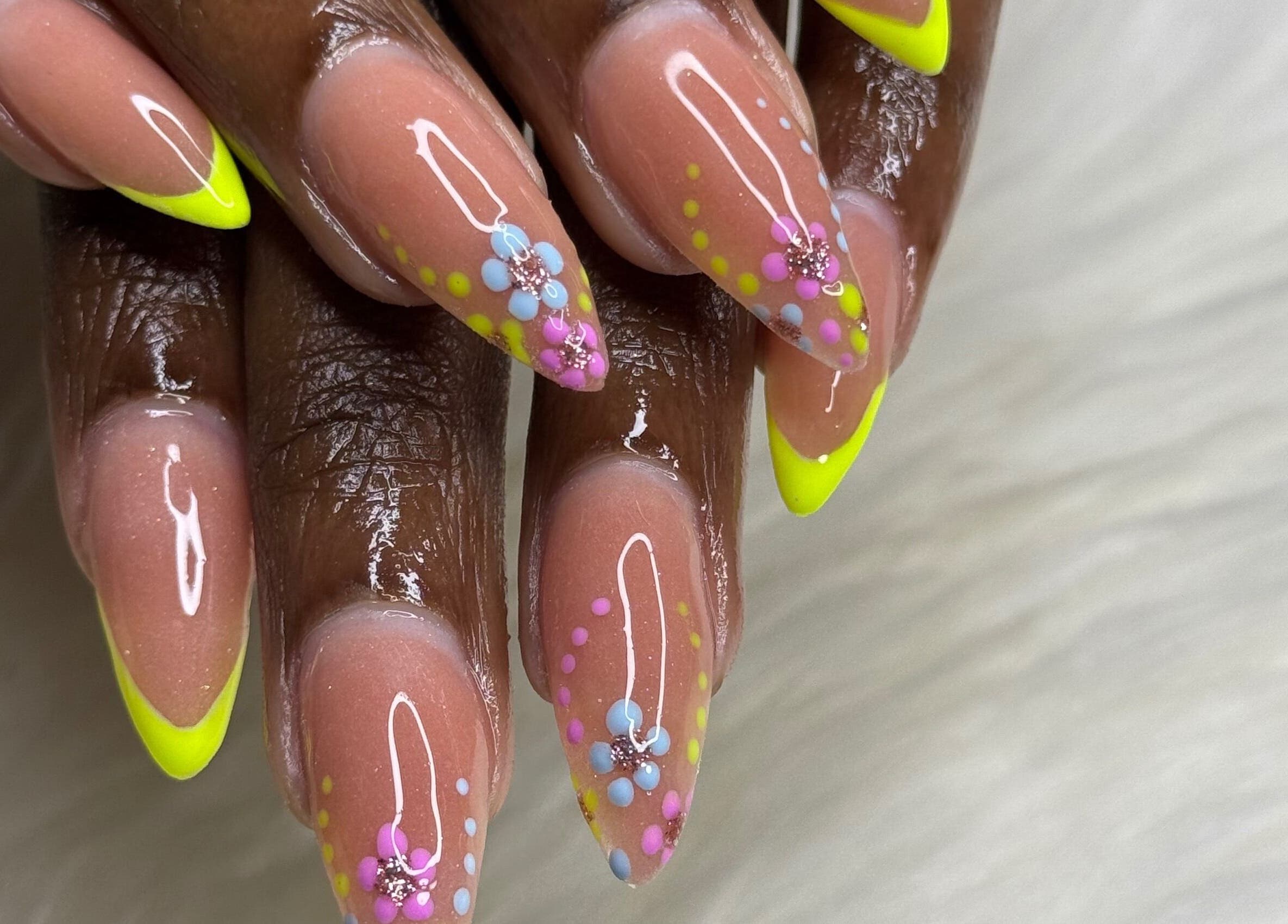 Colorful nail art with floral accents at The Beauty Lab by Rìa-Ashlée, Saint James, Saint James, BB.