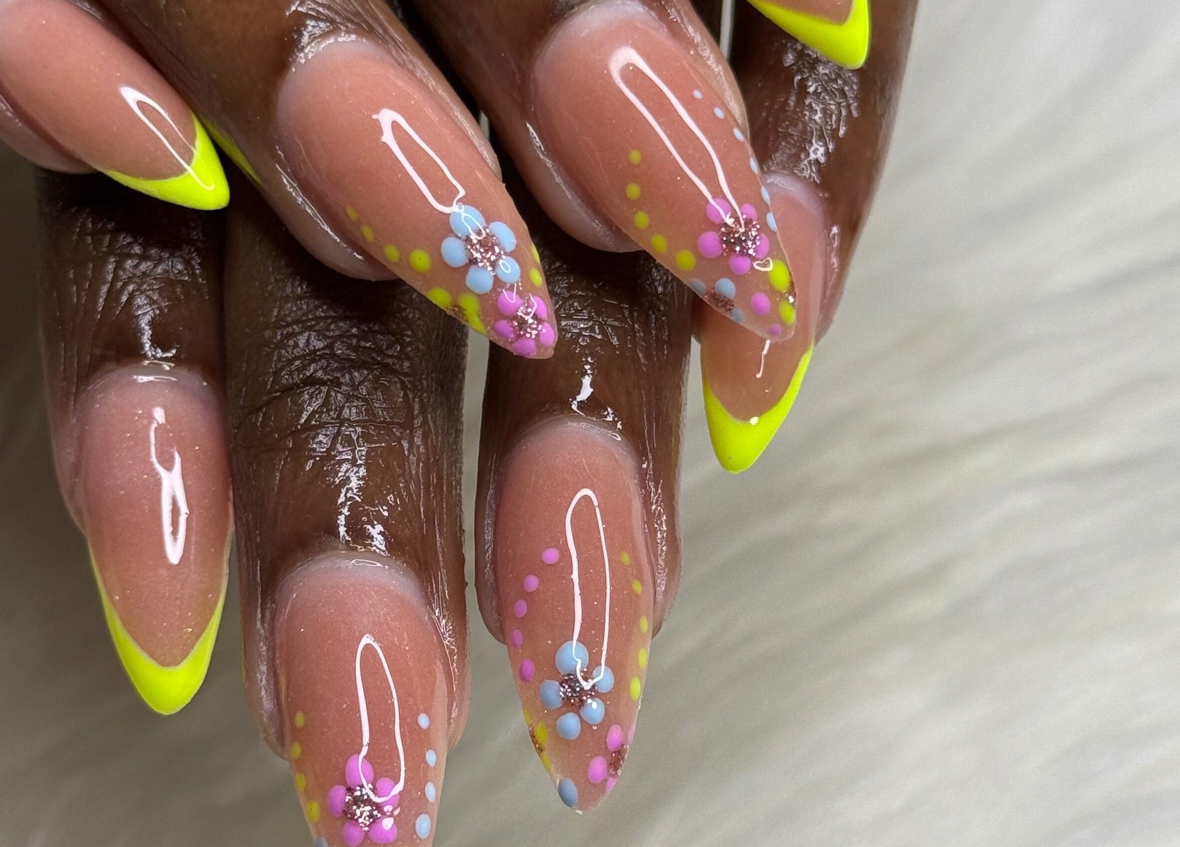 Colorful nail art with floral accents at The Beauty Lab by Rìa-Ashlée, Saint James, Saint James, BB.