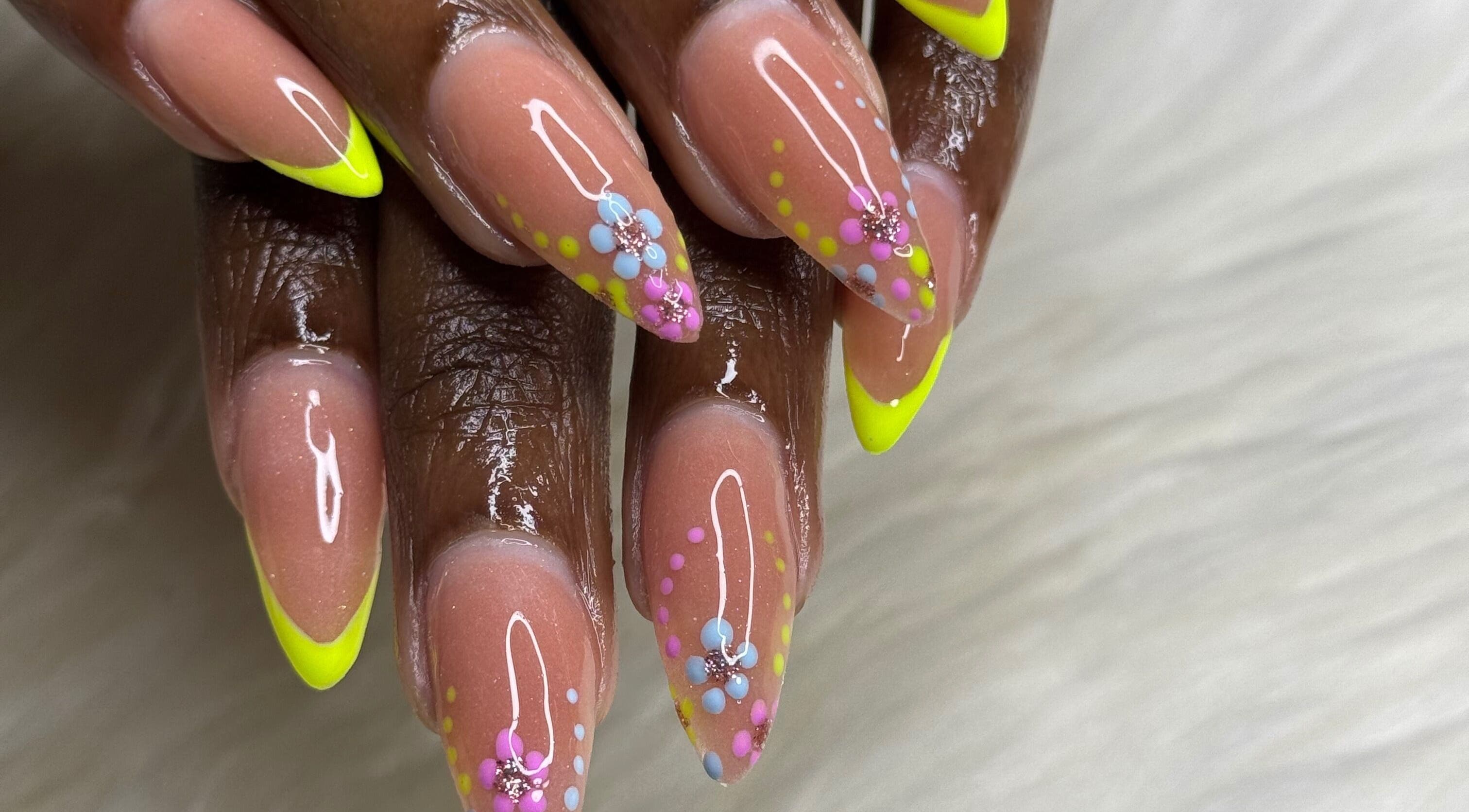 Colorful nail art with floral accents at The Beauty Lab by Rìa-Ashlée, Saint James, Saint James, BB.